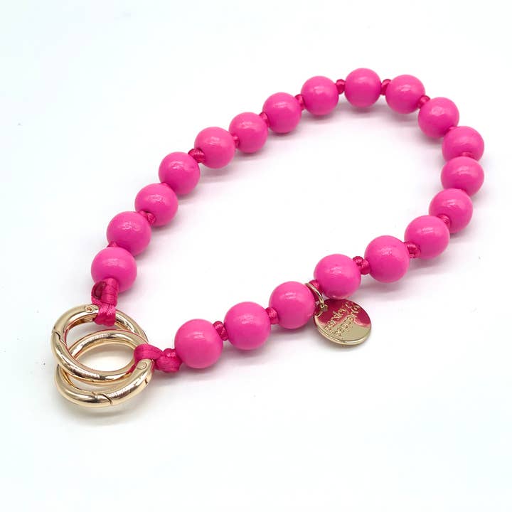 Stylische Handykette mit Holzperlen in pink.