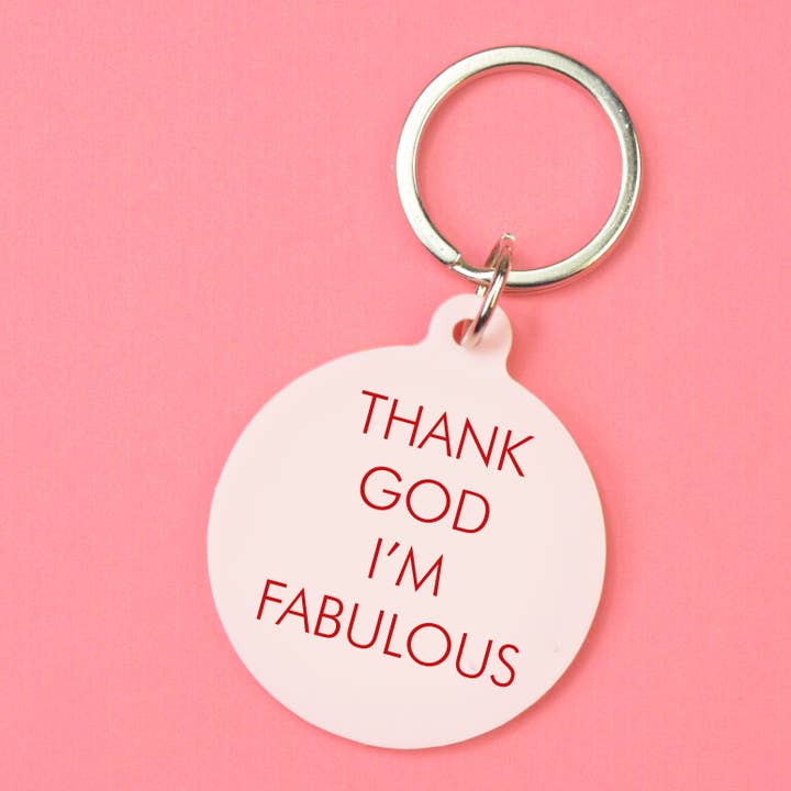 Schlüsselanhänger von Flamingo Candles mit Statemant "Thank god I´m fabulous" auf rosa Acryl graviert. 