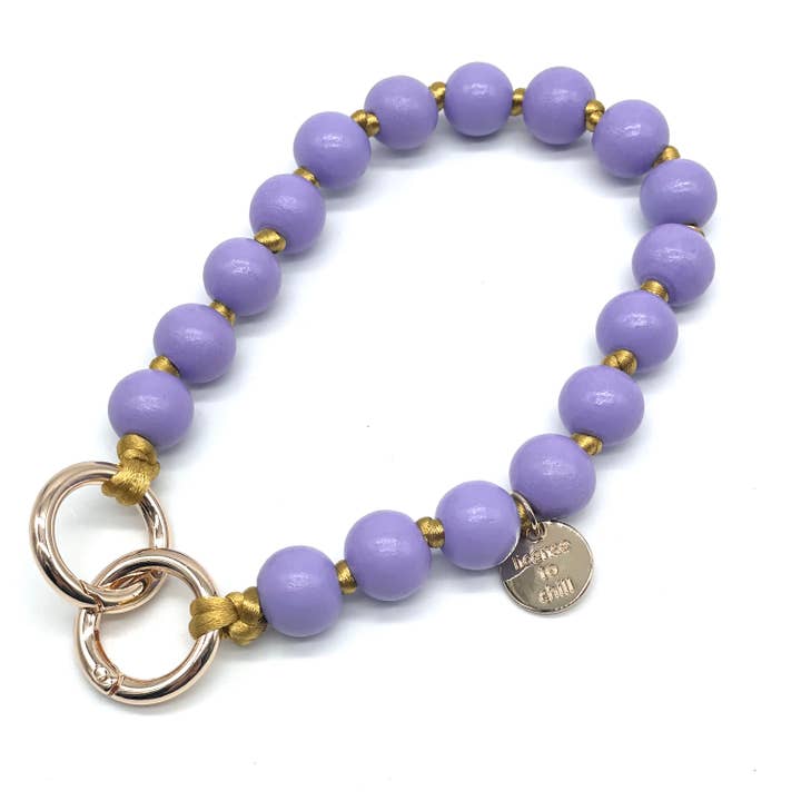 Stylische Handykette mit Holzperlen in den sommerlichen Farben lila & goldenem. 