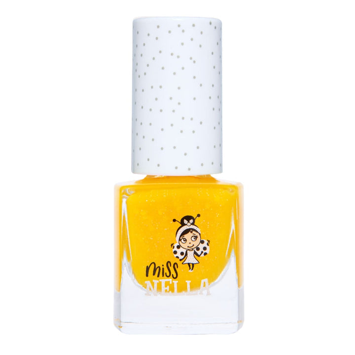 Der Kindernagellack "Honey Twinkles" im sonnigen Gelb von Miss Nella.