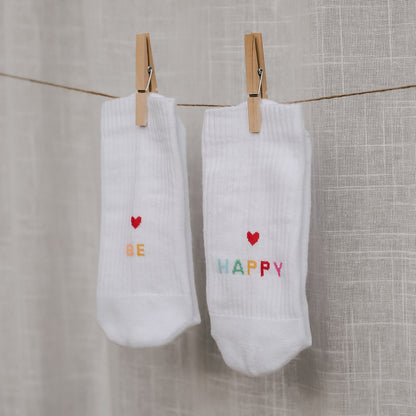Weiße Socken "Be happy" von Eulenschnitt – stylisch